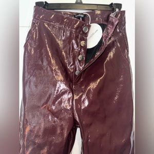 High waisted burgundy leather pants